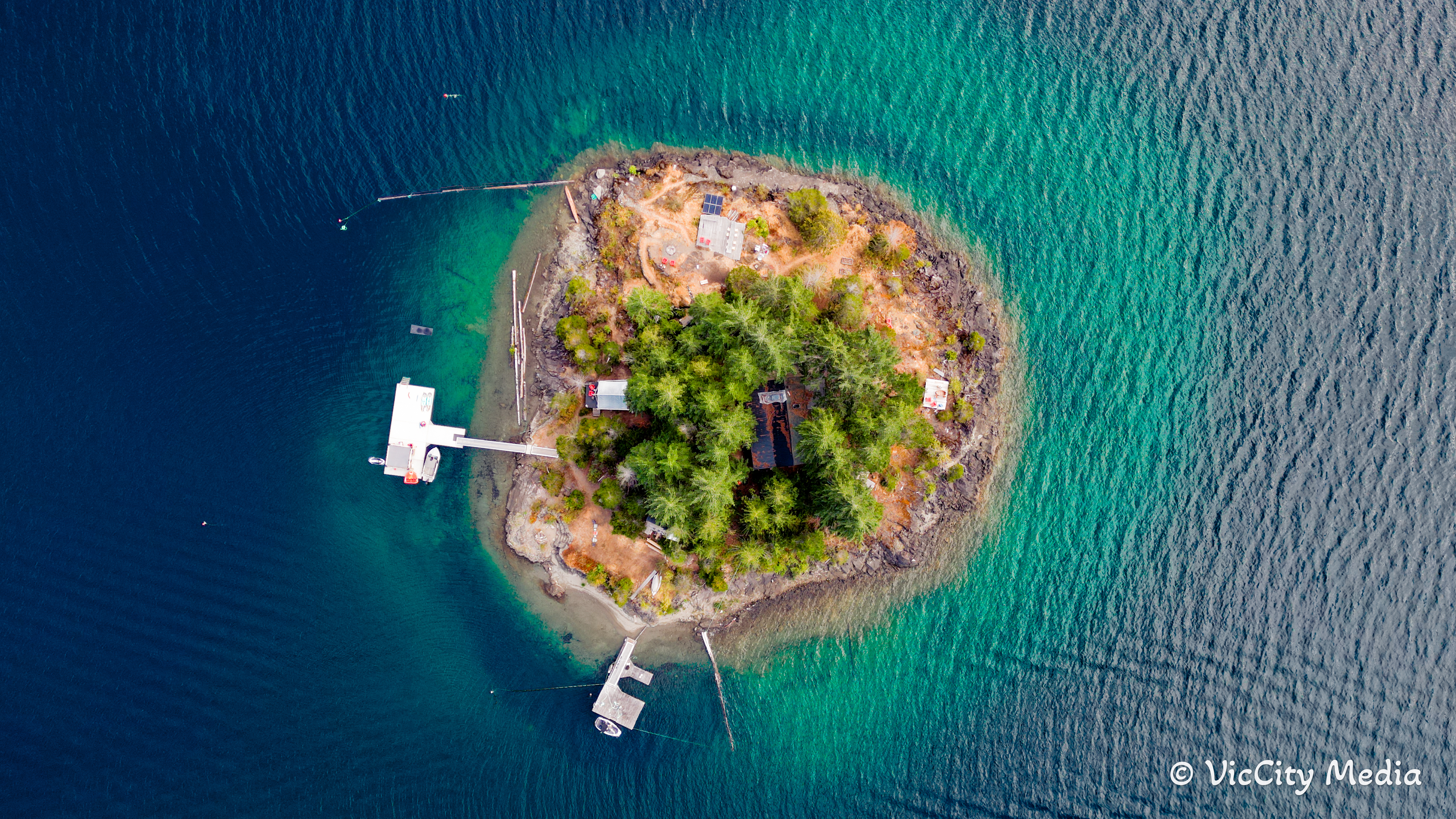 Aerial drone photo of private island Sproat Lake Vancouver Island BC VicCity Media